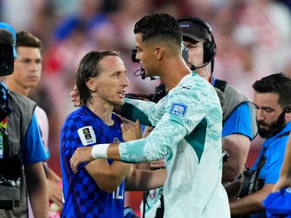 كريستيانو رونالدو ولوكا مودريتش يتعانقان بعد مباراة بين البرتغال وكرواتيا في كأس العالم - 2 يوليو 2026 - IMAGN IMAGES via Reuters