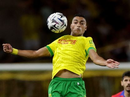 لاعب نانت مصطفى محمد خلال مباراة باريس سان جيرمان في الدوري الفرنسي - 17 أغسطس 2025 - ٌReuters