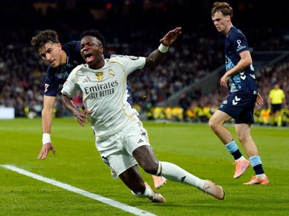 فينيسيوس جونيور وخافي رودريغيز من مباراة ريال مدريد وسيلتا فيغو في الدوري الإسباني - 7 ديسمبر 2025 - Reuters