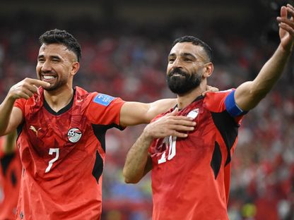 محمود تريزيغيه يحتفل بهدفه مع محمد صلاح خلال مباراة مصر ونيوزيلندا بكأس العالم - 22 يونيو 2026 - Reuters