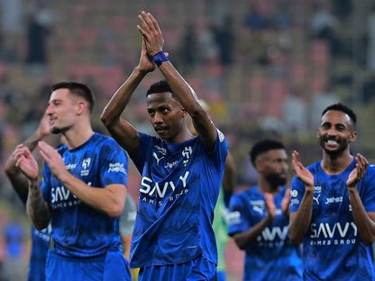 لاعبو الهلال يحيون الجمهور بعد الفوز على الاتحاد في الدوري السعودي-30 أكتوبر 2025 - Reuters