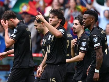 لاعبو البرتغال يحتفلون بأحد الأهداف أمام أرمينيا في تصفيات كأس العالم - 16 نوفمبر 2025 - Reuters