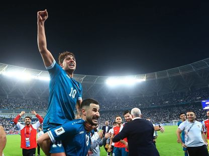 احتفال لاعبي منتخب العراق بالتأهل إلى الملحق العالمي المؤهل لكأس العالم 2026 - 19 نوفمبر 2025 - X/@IraqNT_EN