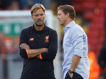 يورغن كلوب ويوليان ناغلسمان قبل مباراة بين ليفربول وهوفنهايم في دوري أبطال أوروبا – 23 أغسطس 2017 - REUTERS