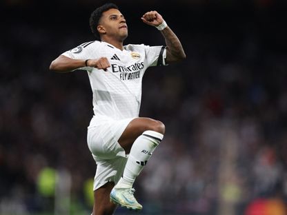 رودريغو مهاجم ريال مدريد يحتفل بالتسجيل في مرمى أتلتيكو مدريد بدوري أبطال أوروبا - 4 مارس 2025 - Reuters
