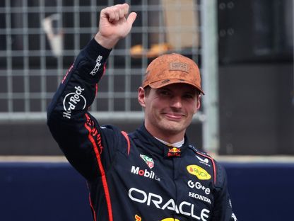 ماكس فرشتابن يحتفل بفوزه بسباق السرعة في جائزة أميركا لفورمولا 1 - 18 أكتوبر 2025 - Reuters