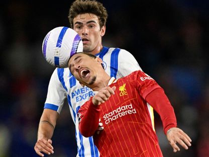 مات أوريلي وكوستاس تسيميكاس في مباراة برايتون وليفربول 20-5-2025 - Reuters