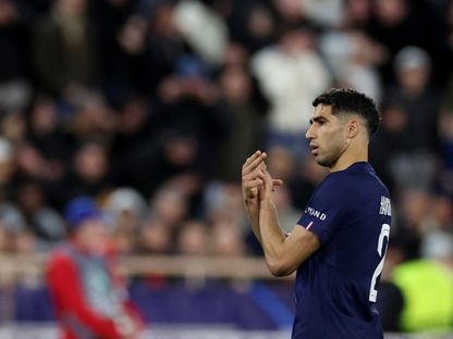 المغربي أشرف حكيمي احتفالاً بهدفه في مرمى موناكو في ذهاب ملحق ثمن نهائي دوري أبطال أوروبا - 18 فبراير 2026 - Reuters