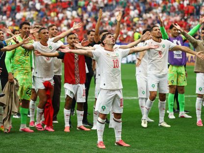 لاعبو المغرب يحتفلون بعد الفوز على كندا والتأهل لربع نهائي كأس العالم - 4 يوليو 2026 - Reuters