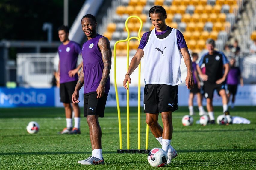 لاعبو مانشستر سيتي خلال حصة تدريبية - AFP