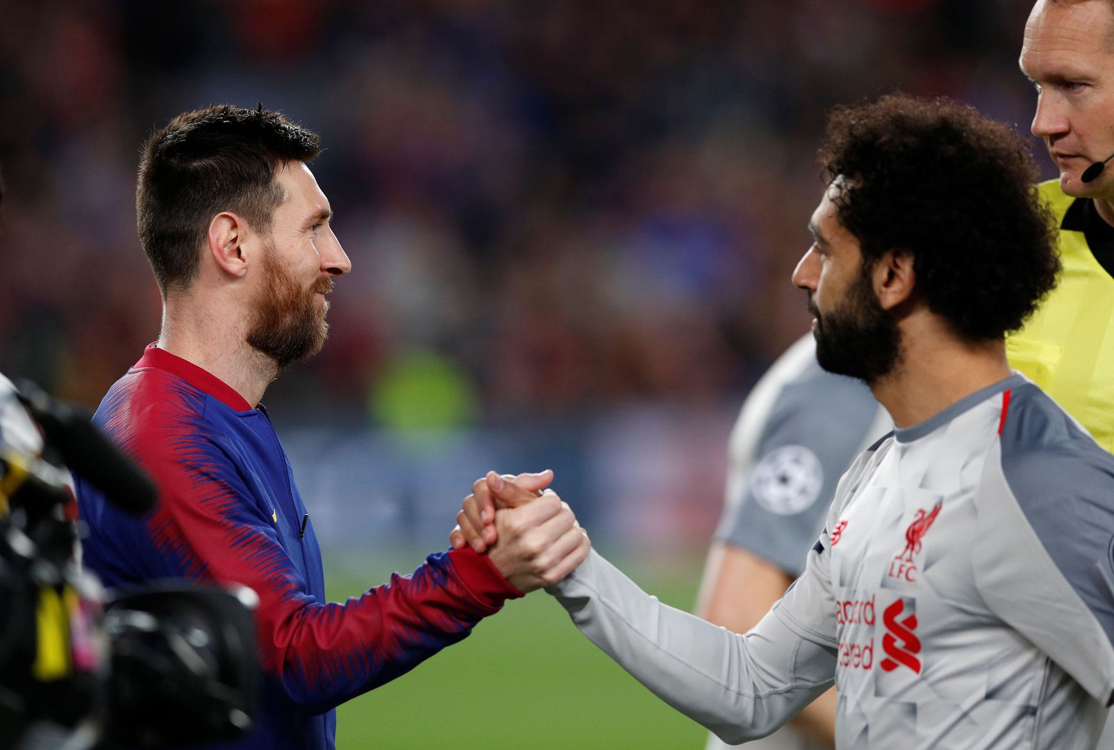 ليونيل ميسي ومحمد صلاح خلال مباراة نصف نهائي دوري أبطال أوروبا التي جمعت برشلونة وليفربول