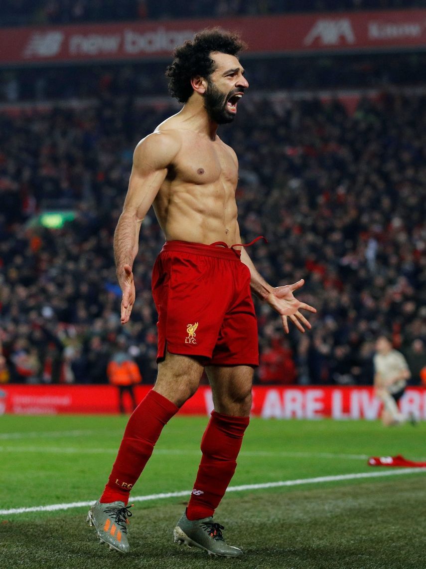 مهاجم ليفربول محمد صلاح يحتفل بعد تسجيله هدفاً في شباك مانشستر يونايتد - REUTERS