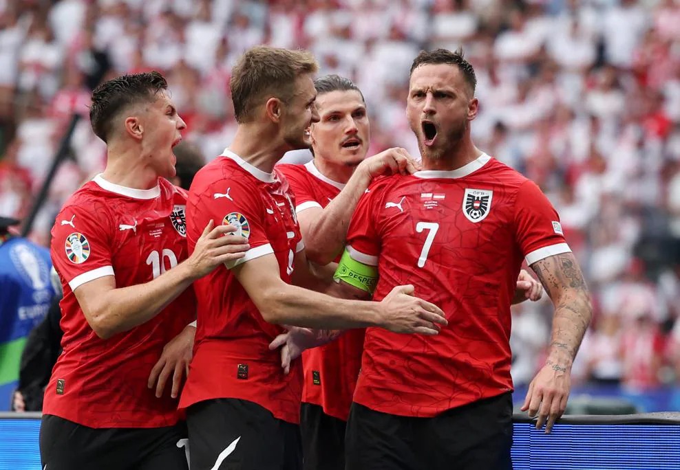 لاعبو منتخب النمسا يحتفلون بالتسجيل في مرمى بولندا ببطولة أوروبا 'يورو 2024'- 21 يونيو 2024